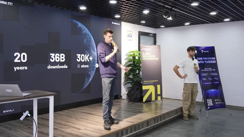 Mathias Arlaud and Robin Chalas on stage presenting their talk about Symfony 8