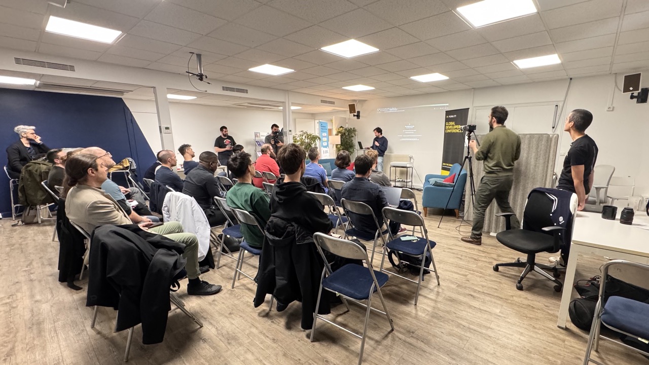 Attendees listing to one of the Fork it! Community Paris Meetup talk