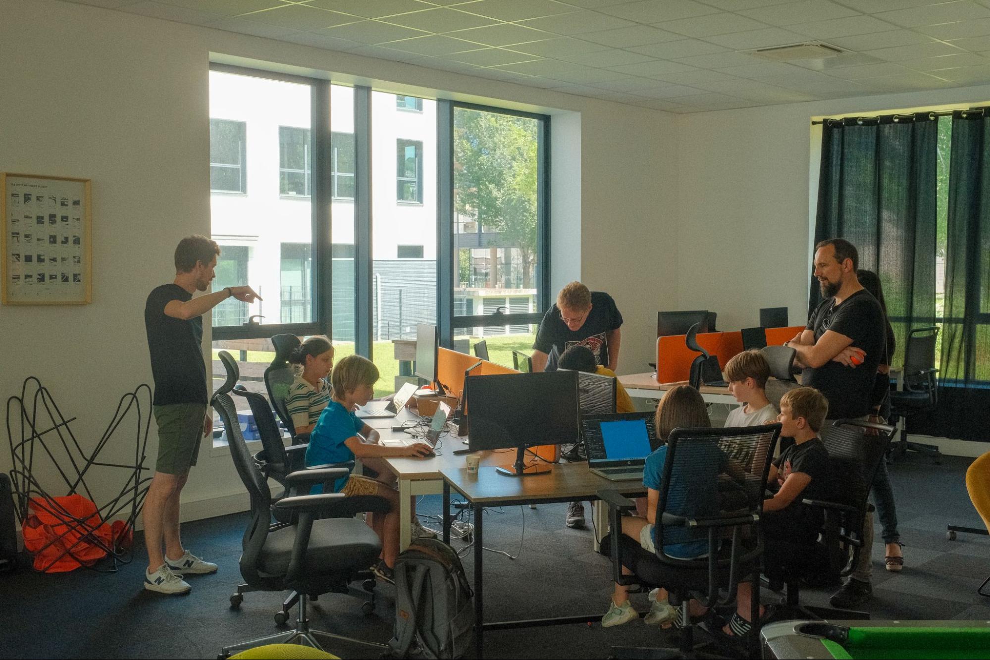 Kids learning hot to develop a video game